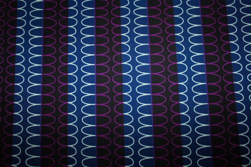 Designerbaumwollstoff Boundless Binding brombeere (10 cm)